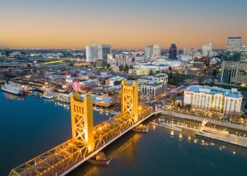 Aerial shot of the Tower Bridge spanning across the Sacramento River in California.