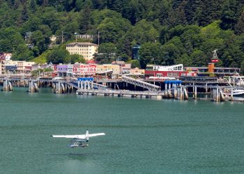 Seaplane floating over water near the town of Juneau, Alaska