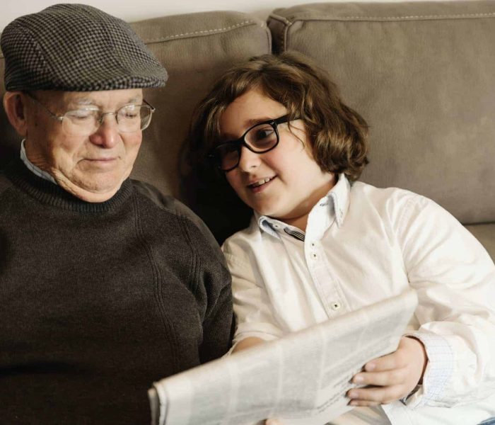 grandfather-and-grandson-reading-the-news-.jpg